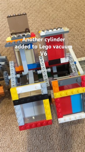 Lego motor powering Lego vacuum V6.