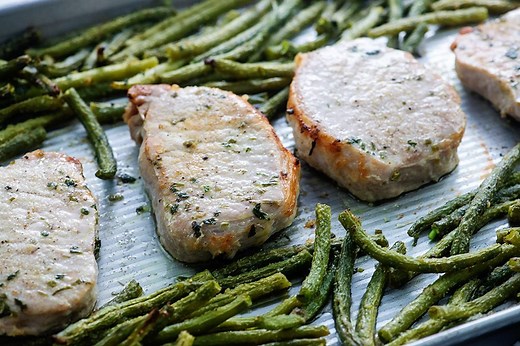 ✅ RECIPE: https://thatlowcarblife.com/baked-ranch-pork-chops-green-beans/ These juicy BAKED RANCH PORK CHOPS are cooked together on a sheet pan with a pile of fresh green beans. | That Low Carb Life
