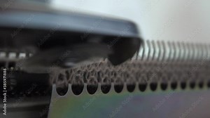 Female hands making textile on weaving machine at factory. Knitting machine Close up of weaving fabric on loom machine. Manufacturing knitted fabric on manual knitting equipment. Textile industry Stock Video