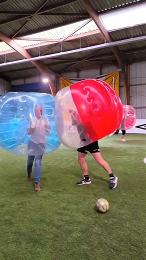 Fact Cus on Instagram: "Would You Play This Crazy Bull Game? This is Bubble Bull Soccer, a wild mix of traditional bull fighting and football. Players wear giant inflatable bubbles to protect their upper bodies. Their legs stay free so they can run and kick the ball. But here’s the twist — a real bull is released on the field. The goal is to score while avoiding getting knocked down. #bubblebullsoccer #crazygames #extremesports #bullchallenge #wildsports Disclaimer: This video is for entertainme