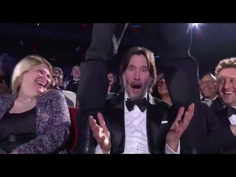 Jonathan Groff Climbs Up On A Seated Keanu Reeves, Leaving Him Utterly Shocked