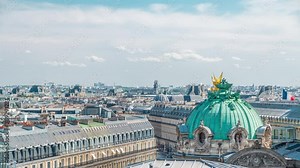 Top view of Palais or Opera Garnier The National Academy of Music timelapse in Paris, France. Aerial view from rooftop at sunny summer day.