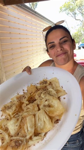 Andrea 👋 on Instagram: "Post-Cypriot wedding traditions 🇨🇾 The day after a family wedding is for pites, fried homemade pastry drenched in honey and walnuts and bourekia filled with halloumi and mint. Recipe filming on days like this? Pure chaos. But always worth it 🤪 This is what tradition tastes like. #cyprus #traditions"
