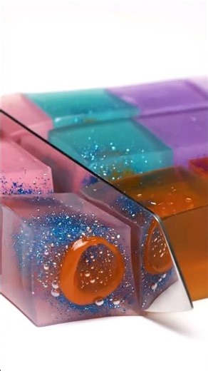 Jelly-Cubes explode to reveal shimmering stardust and gooey gel🧡💜 – #asmr #satisfying #relaxing