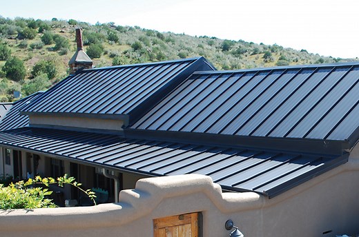 Standing Seam vs. Stamped Metal Shingle Roofs: Which is Best For You?