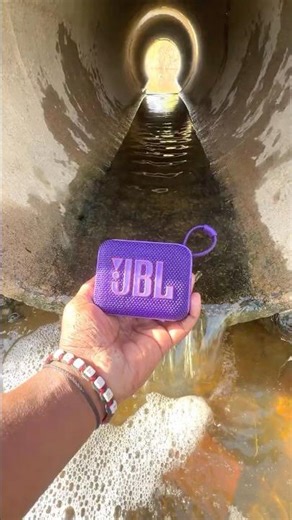 Jbl go4 speaker throw in water pool for bass testing
