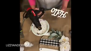 Who would have thought we could turn a pizza pan from Dollar tree into something so cute!? This may have just become my new favorite! LizzyandErin.com | Lizzy and Erin