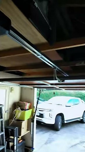 Bft Botticelli 850 Smart Garage Door Opener Installed On A Steel & Cedar Tilt Door