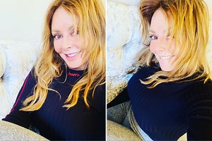 Carol Vorderman looks incredible as she goes make-up free for sexy sofa selfie