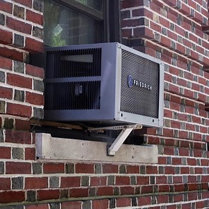 This is why about a quarter of U.S. households are stuck with ugly and loud window AC units. | CNBC