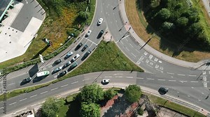 Vehicles Stopping at a Traffic Light Controlled Roundabout System