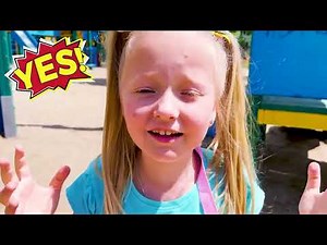 Children playing on a swing in the playground