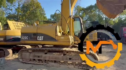 Two caterpillar 320c excavator loading by flat rack container