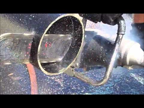 U.S. Saws' Air Chainsaw Cutting a Ductile Iron Pipe