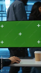 Vertical video Engineer in server hub using green screen PC to repair equipment storing datasets. Professional using mockup computer to do debugging on rigs doing computational operations