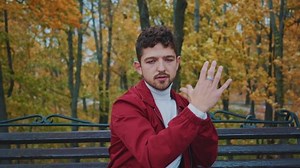 Dancing young active energetic mime showing pantomime and amazing hand choreographic movements. Dancer. Artist. Performance.