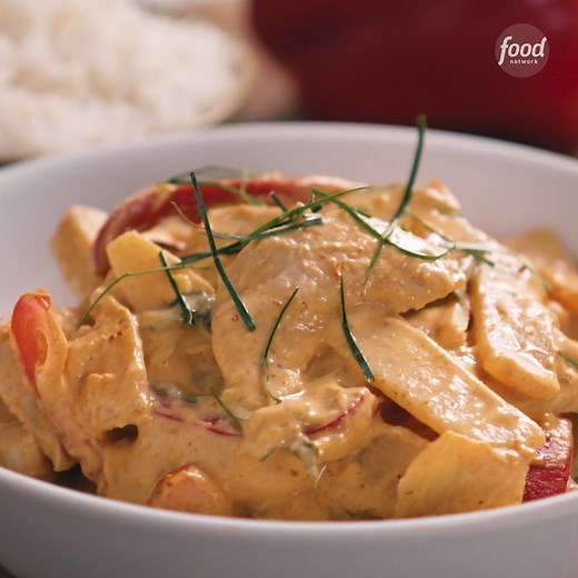 Recipe of the Day: Chef Jet Tila's Panang Chicken Curry 🤩 This creamy, coconut milk-enriched curry is full of veggies and enhanced by the perfume of Thai basil and makrut lime leaves. Pro tip: Don't shake your can of coconut milk. You want the cream to naturally separate and rise to top so that you can use it like cooking oil to fry your curry paste. It helps build incredible flavor! Get the recipe: https://foodtv.com/4dpv4Dq | Food Network