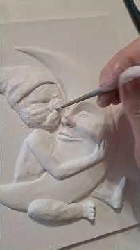 I sculpt a bas-relief and draw the moon and a girl
