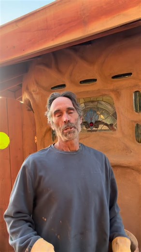Miguel Elliott | Sustainable Cob Builder on Instagram: "Applying a lime wash over the cobin here in Watsonville at the Feel Good Campground"