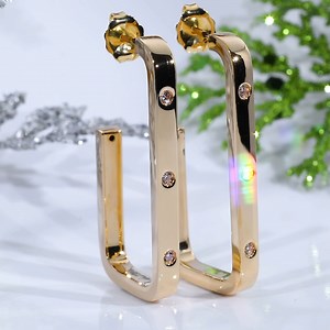 44 reactions · 5 comments | Dressed in holiday style ✨ Hoop earrings in 14kt yellow gold, set with delicate diamonds are trendy, timeless, and totally gift-worthy. Even Santa gets help! Shop these hoops and explore even more Holiday Treasures at the link below. | Confer's Jewelers | Facebook