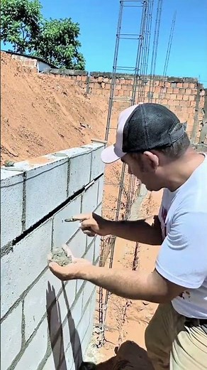 The bricklayer is very clever and developed a technique to install the conduit without cutting th...