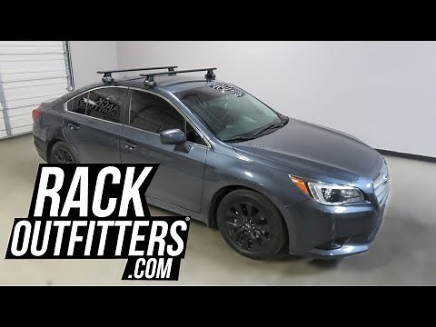 Subaru Legacy with Thule Rapid Traverse AeroBlade Roof Rack Crossbars