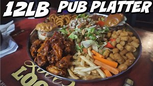 Spicy Wings, burgers, nachos, and so much more! This big food challenge offers a variety of delicious pub food! Cheers is a bar in Kissimmee (Orlando area) Florida and has this huge platter as their food challenge. 2 people, 30 minutes, in hopes for a free meal! I linked up with my good friend Dan Kennedy (he is a great eater) in hopes we could get the job done! | Joel Hansen - Model Vs Food
