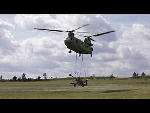 Atlantice Resolve - 101st Airborne Division lifts howitzers during hot and cold load training