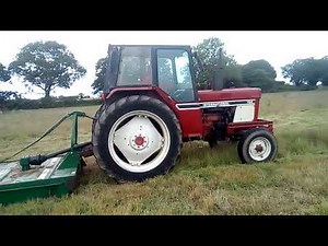Cutting the grass with the IH 784