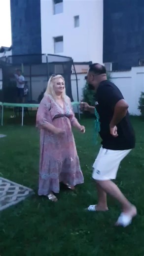 Playful Outdoor Dance Routine in a Backyard