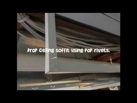 Drop ceiling grid soffit. Using grid framing and pop rivets