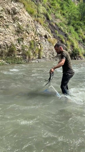 Catching fish in mouth it might escape