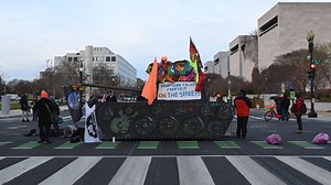 Protesters Block Roads Around Capitol, Park Model Tank in Street