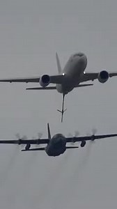 The Air Self Defense Force airplane is connected and refueled in the air union | Trina Parrish