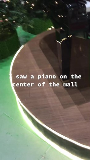 Festive Piano Performance in a Shopping Mall