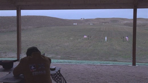 Governor Larry Rhoden shoots ribbon to open new shooting complex