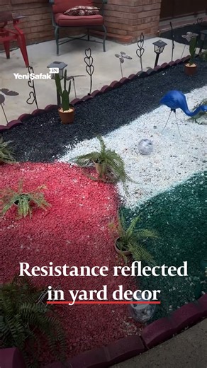 218K views · 36K reactions | A TikTok user shared a video revealing her mother’s decorative yard project, which was designed to resemble the Palestinian flag. The display features colored stones arranged in four sections—black, white, green, and red—to reflect the flag’s pattern. | Yeni Şafak | Facebook