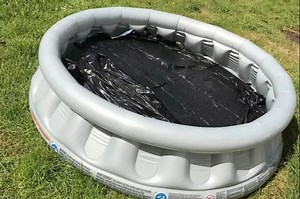 Woman shows how to heat up your freezing paddling pool in 45 mins using bin bags