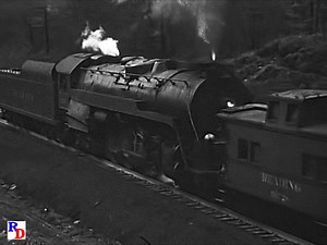 A Reading Railroad loaded hopper train has a trio of Baldwin AS-16 diesels at the head end and a Baldwin T-1 class steam locomotive pushing. Did you know that the Reading T-1s were originally I-10sa class 2-8-0s? From the JPM show "Railfanning the Reading, Vol 1" https://rfd.video/Reading1 | Steam Giants