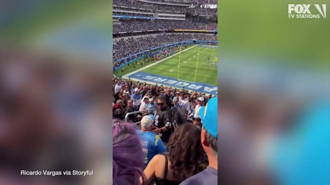 VIDEO: Fight breaks out between fans during rivalry Chargers-Raiders game at SoFi Stadium
