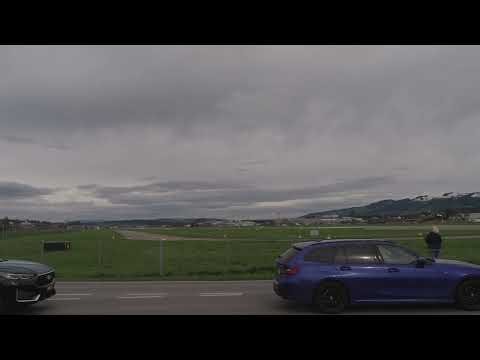 Emmen Air Base Patrouille Suisse fighter jets landing on cloudy winter day.