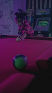 Girl in a Japanese style dress playing pool - Free Stock Video