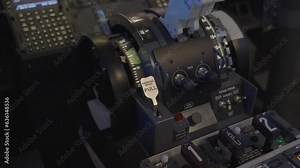 Close-up shots from a Boeing 737 cockpit. Instruments and levers inside a jet plane, in 4K 30fps.