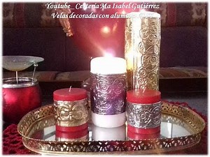 Candles decorated with foil for a beautiful and elegant result. DIY