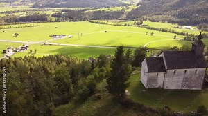 Exploring the small and scenic village in the Styrian part of the Salzkammergut. With only a few inhabitants, 2 Churches are there and they have a breathtaking view over the Austrian Alps.