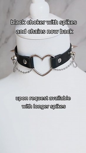 Black choker with silvery apikws and chains. Perfect for a soft grunge or mallgoth look. Upon request available with longer spikes. Matching choker extenders are in our shop highlights as well. #gothicchoker #leathernecklace #etsychoker #chokers #grungechoker #blackleather #gothicnecklace #etsyjewelry #choker #chokerextender #gothichandmade #spikechoker #conestuds #grungeaesthetic #chokerstyle
