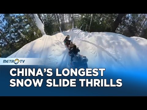 Epic 2000m Snow Slide Draws Thrill Seekers in China