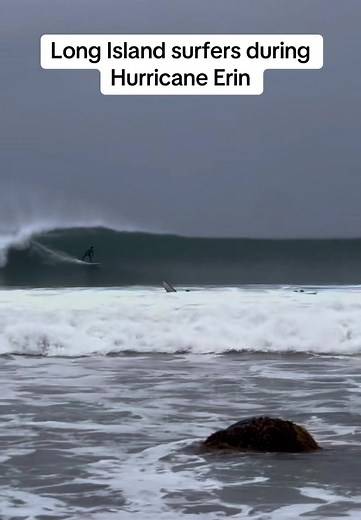 Surfers Ride Waves on Long Island During Hurricane Erin