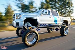 1500 GMC Sierra 2014 WITH A SOLID AXLE SWAP?!? It steers and drives all down the streets of Las Cruces/El Paso Texas! Today on Salinas I have Rocky Bolanos's 2014 GMC Sierra 1500. His shop Rockin rods built this truck for their boss Rocky to enjoy. With a custom 12 inch lift that includes a Solid Axle Swap from a F250! The lift kit has a custom 4 link powder coated lollipop blue with Coil overs in the front for a super smooth ride. Rack and pinion delete with custom mount for power steering and 