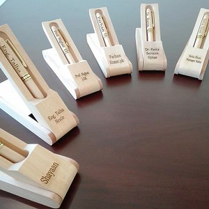 644K views · 812 shares | One of its kind Executive Wooden Ball Pen with ‘Permanent Engraved Name’ both on pen and box ✍️ Stylish sleek wooden box which turns into a pen stand making it perfect partner for your desk ❤️ A must have essential for your office, work or college. Also makes a perfect gift for all occasions Limited Stock  Shop Now: https://goo.gl/Ri5sf3 | MugArt | Facebook